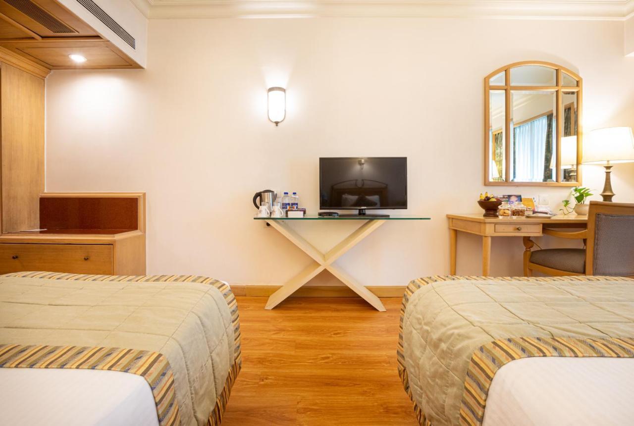 The Orchid Hotel Mumbai Vile Parle Extérieur photo A room at the hotel